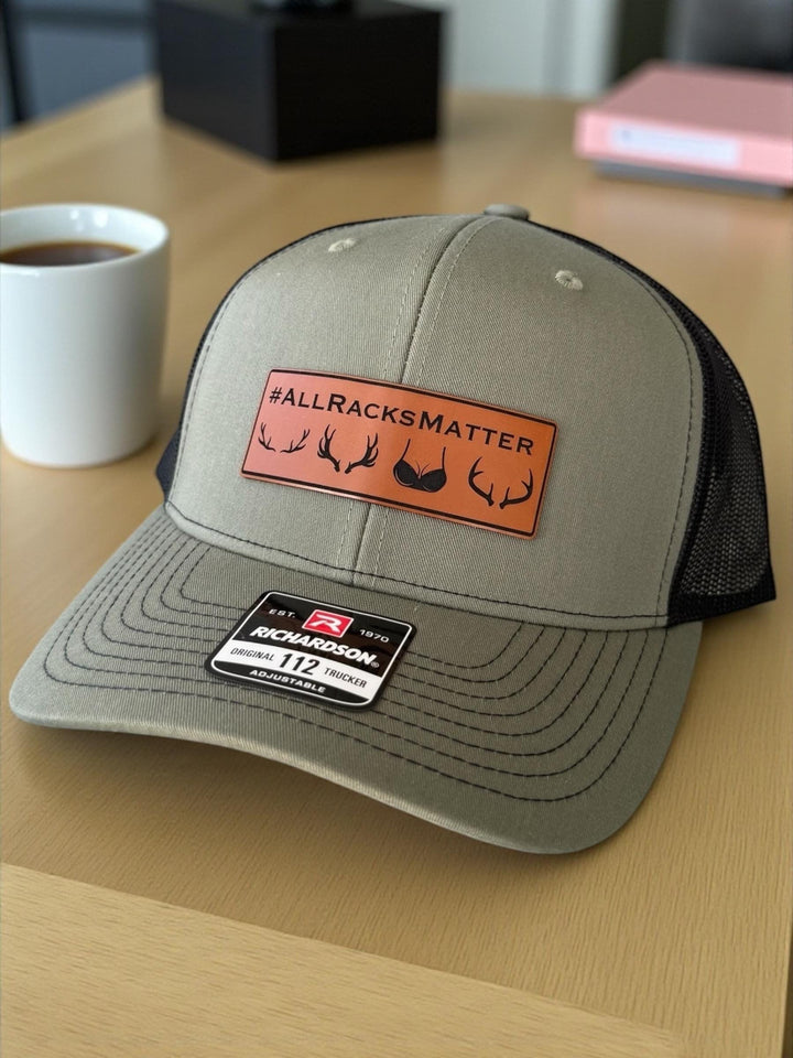 All Racks Matter blaze orange hunting Richardson 112 trucker hat by BubbleHead Ink