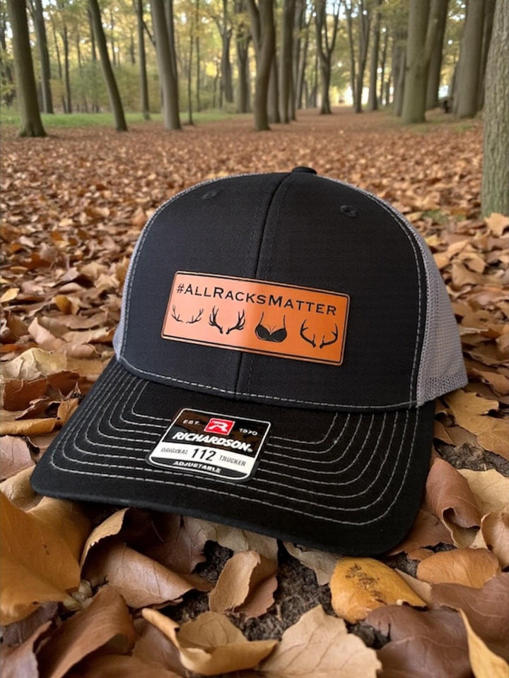 All Racks Matter blaze orange hunting Richardson 112 trucker hat by BubbleHead Ink