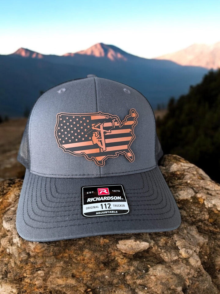 American flag lineman trucker hat by BubbleHead Ink