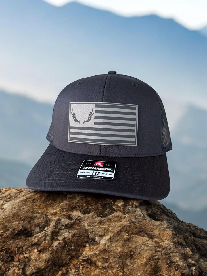 Deer antler American flag hunting Richardson 112 trucker hat by BubbleHead Ink
