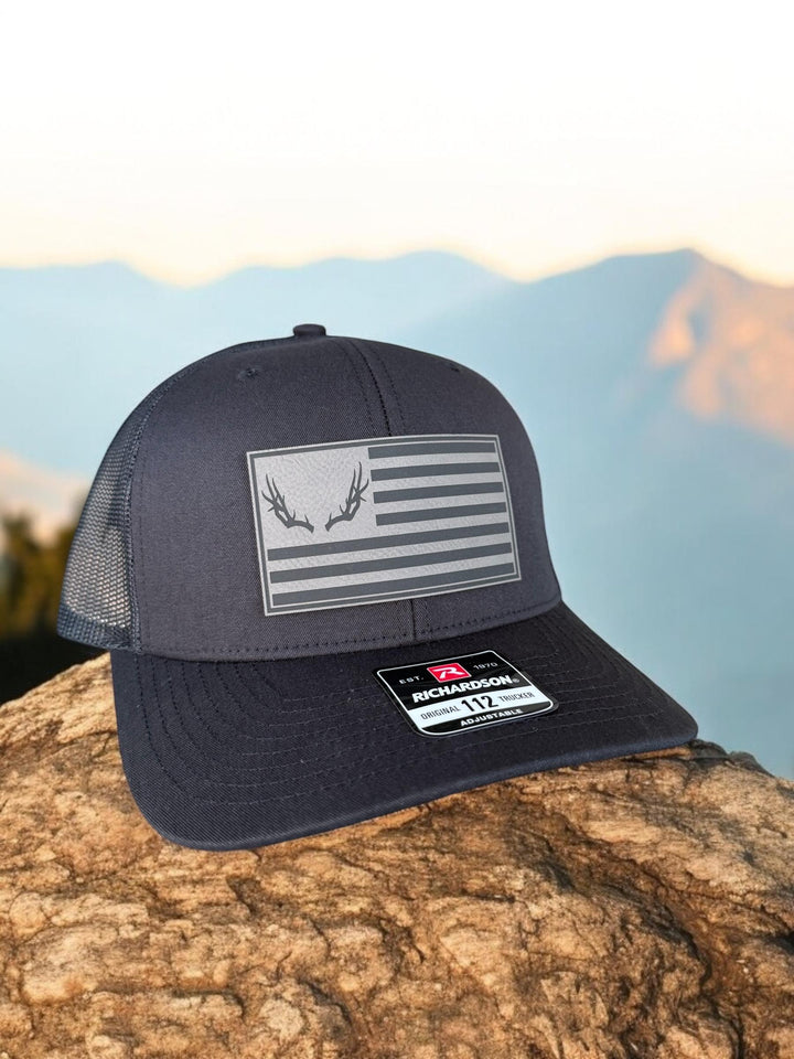 Deer antler American flag hunting Richardson 112 trucker hat by BubbleHead Ink