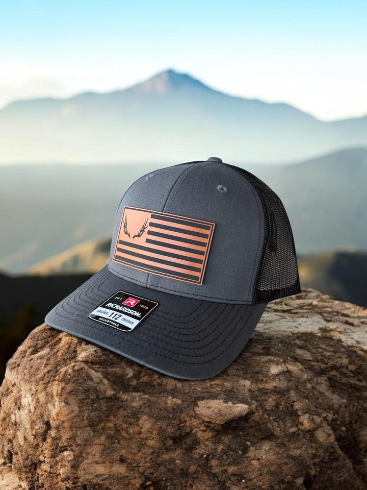 Deer antler American flag hunting Richardson 112 trucker hat by BubbleHead Ink