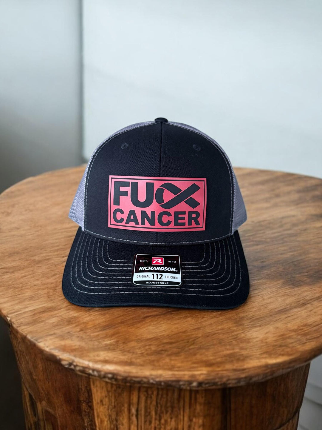 Blood cancer awareness red ribbon ponytail trucker hat by BubbleHead Ink