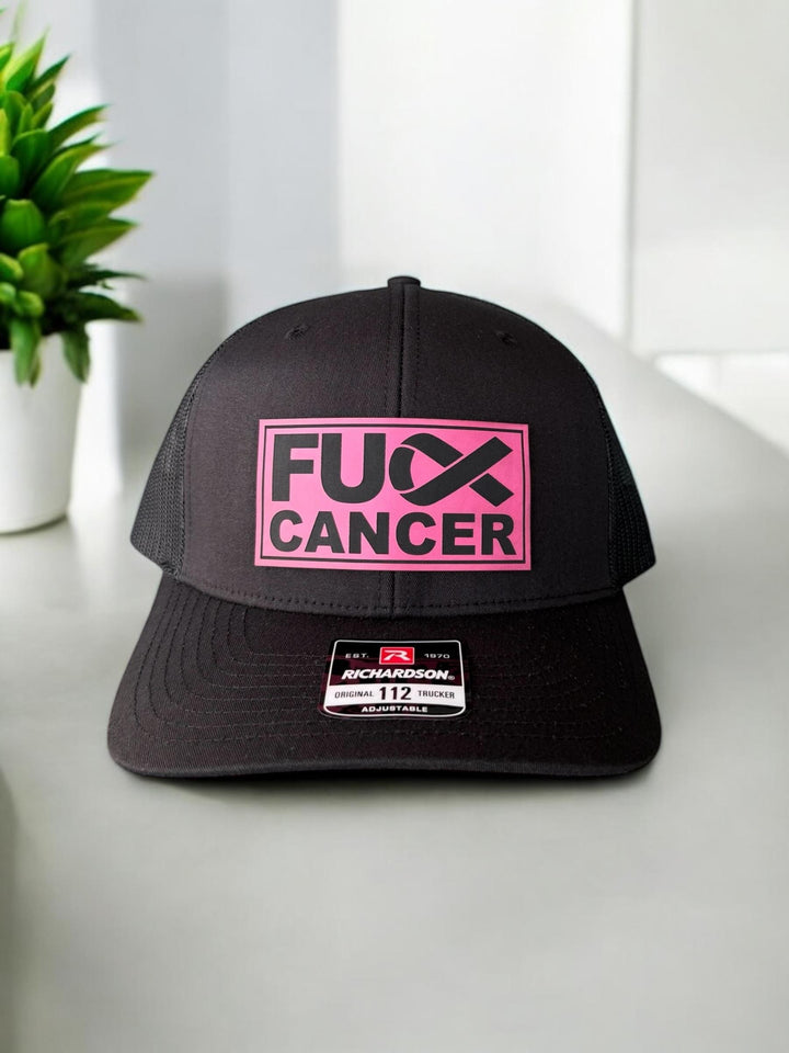 Breast cancer awareness pink ribbon Richardson 112 trucker hat by BubbleHead Ink