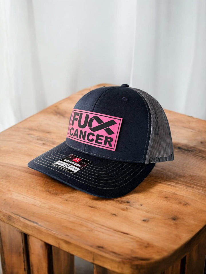 Breast cancer awareness pink ribbon Richardson 112 trucker hat by BubbleHead Ink