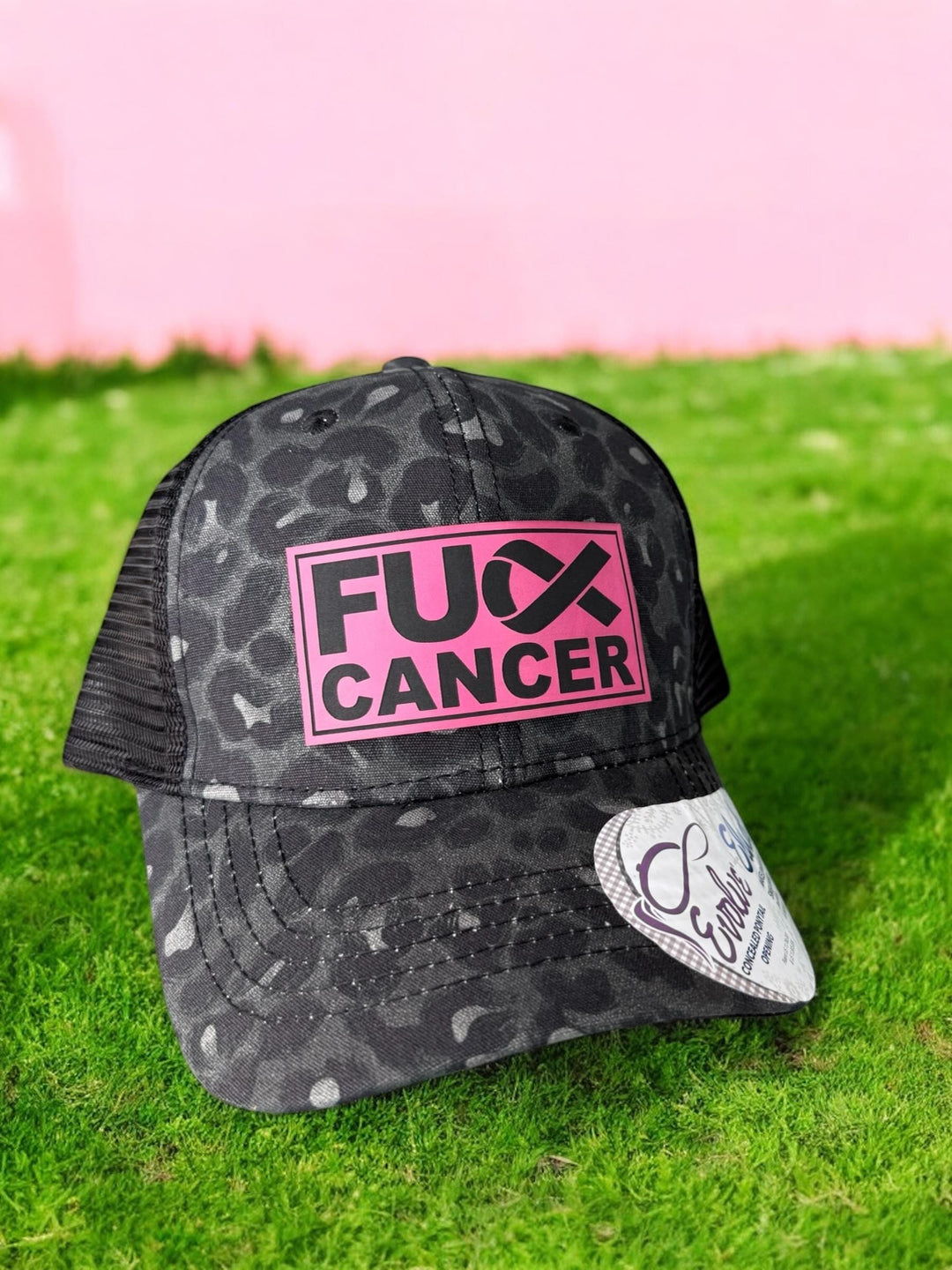Breast cancer awareness leopard pink ribbon women's trucker hat by BubbleHead Ink