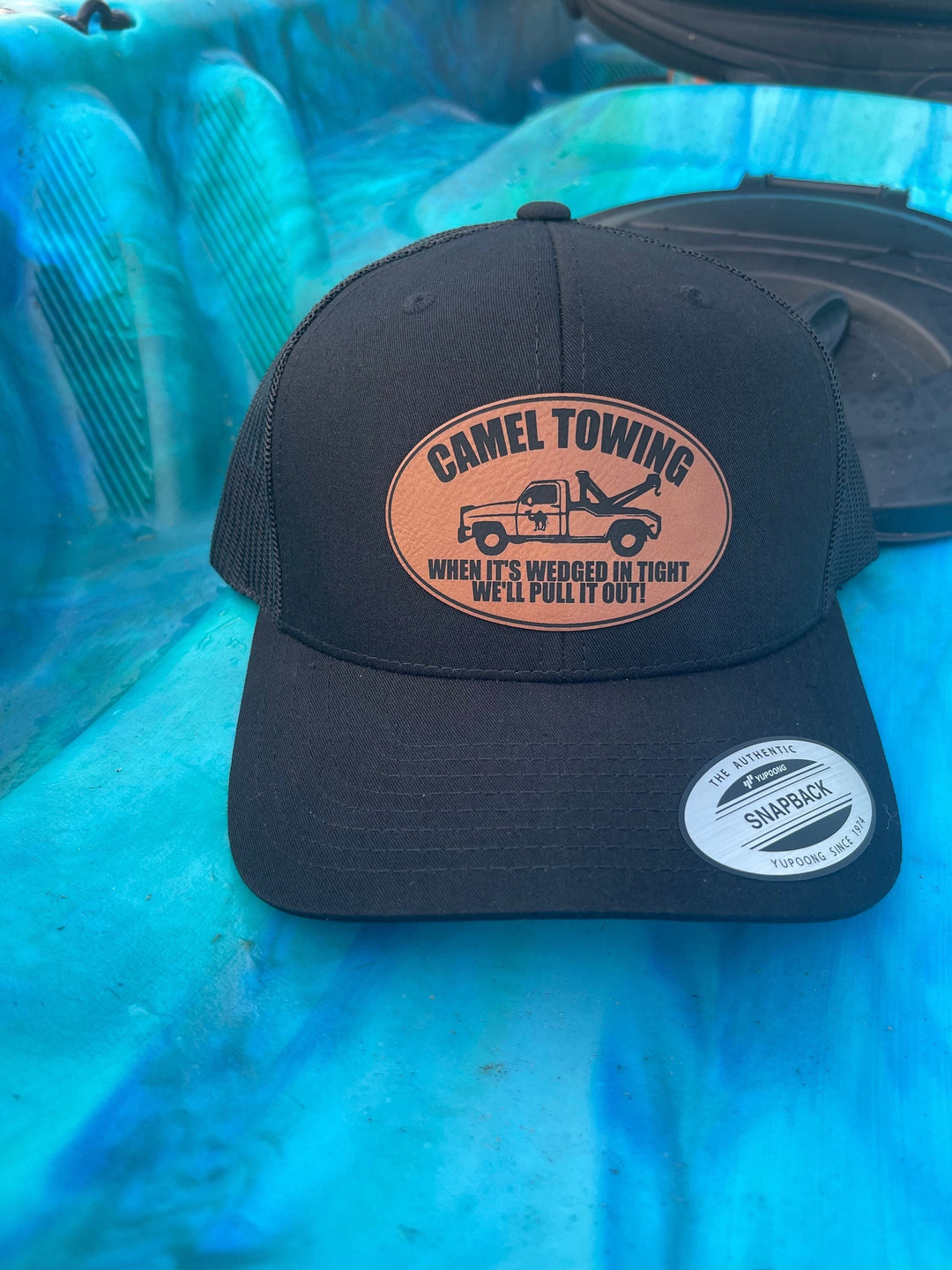 Camel Towing funny trucker hat with leather patch by BubbleHead Ink