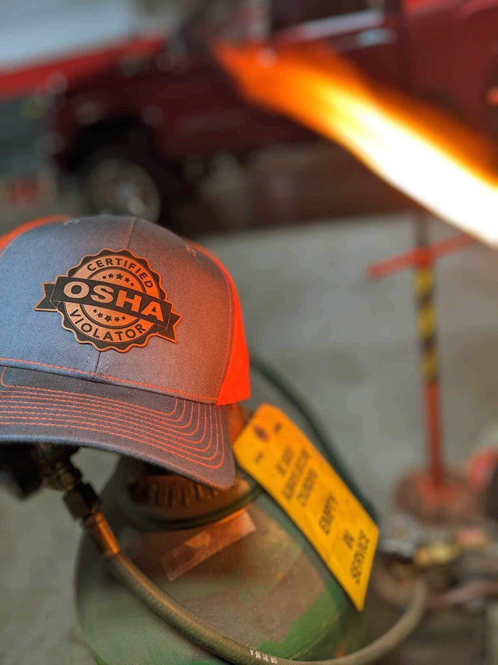 Certified OSHA Violator funny trucker hat with leather patch by BubbleHead Ink