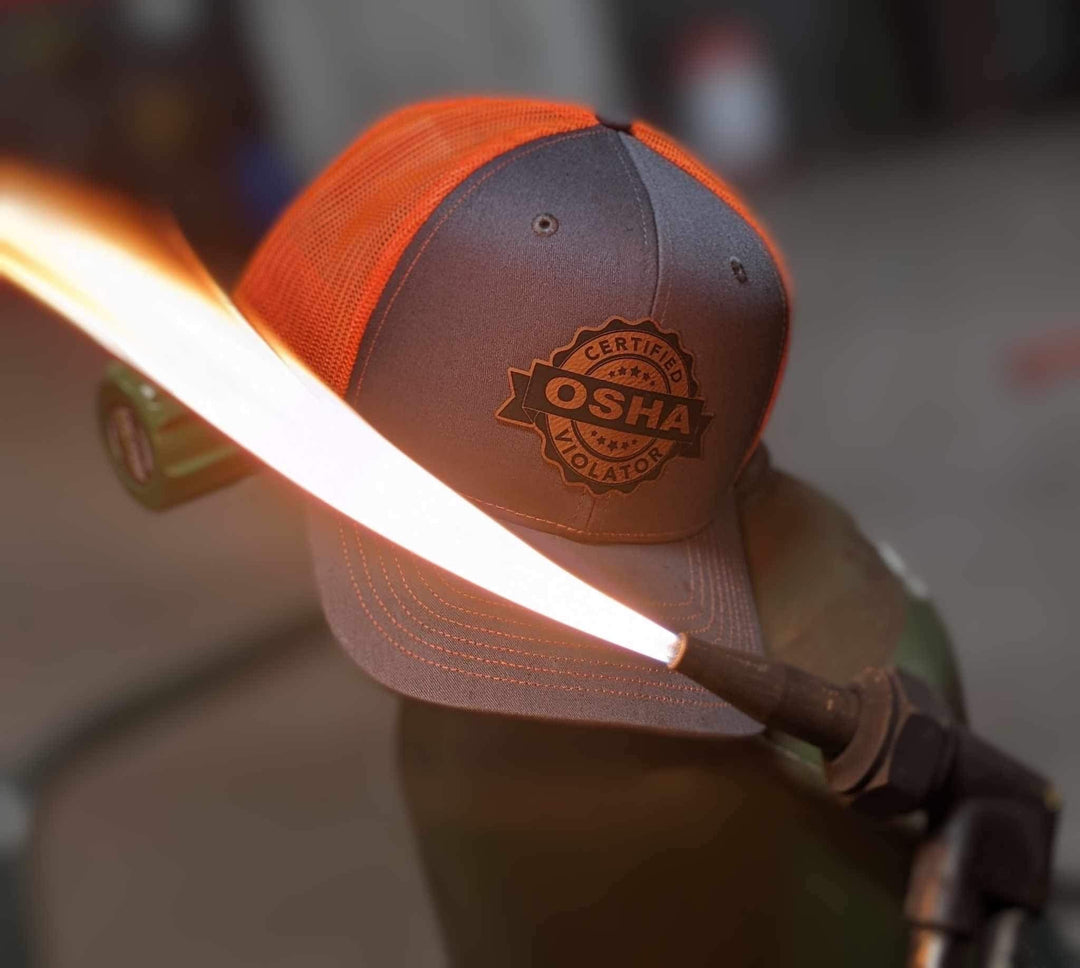 Certified OSHA Violator funny trucker hat with leather patch by BubbleHead Ink