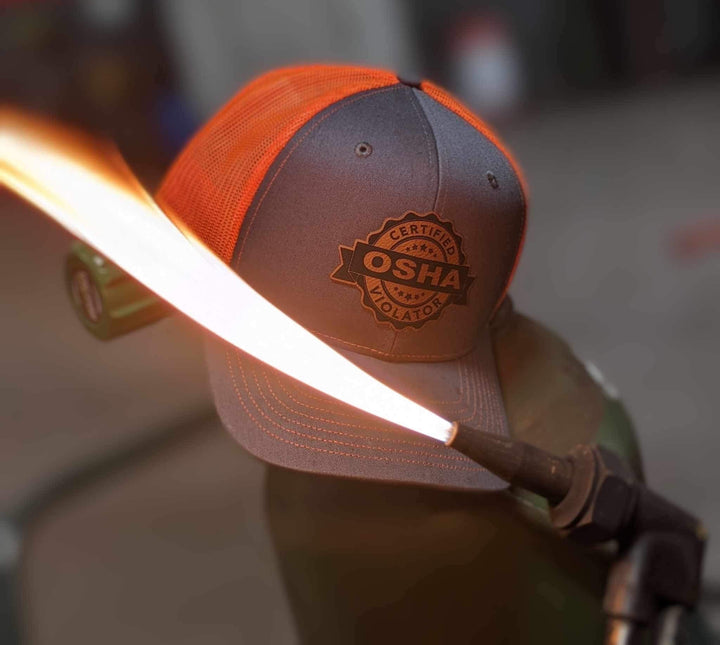 Certified OSHA Violator funny trucker hat with leather patch by BubbleHead Ink