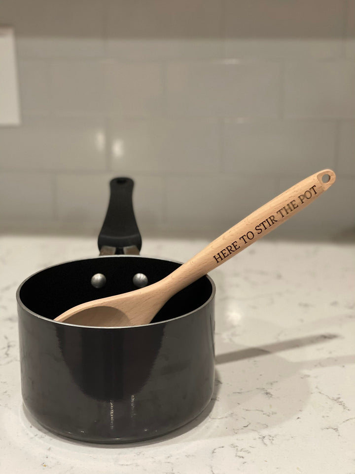 Custom engraved wooden spoon personalized with your phrase by BubbleHead Ink