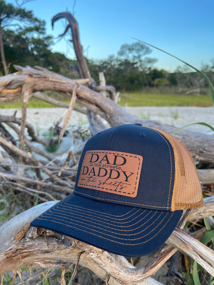 Dad in the Streets Daddy in the Sheets trucker hat in navy and caramel by BubbleHead Ink