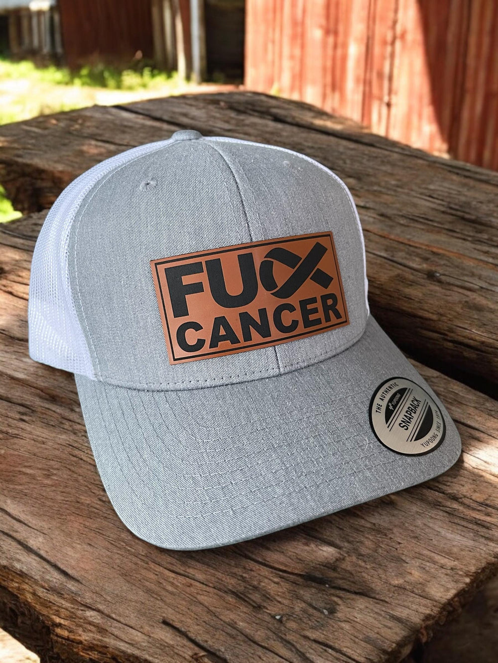Fuck Cancer unisex cancer survivor trucker hat by BubbleHead Ink