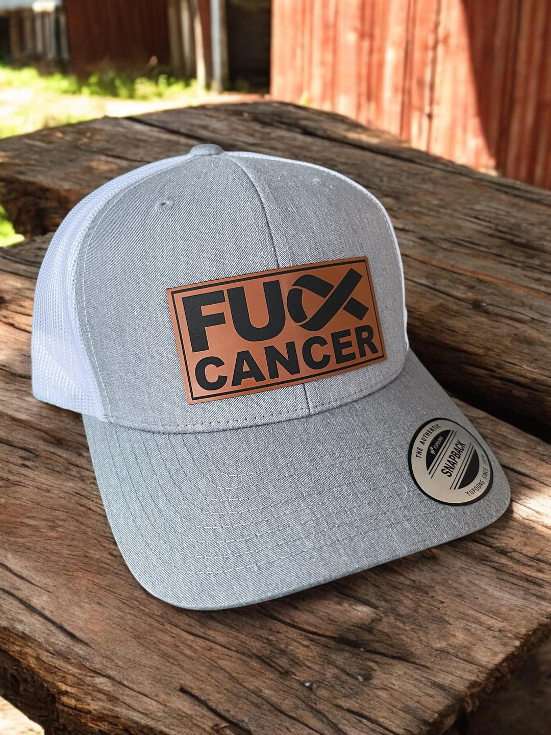 Fuck Cancer unisex cancer survivor trucker hat by BubbleHead Ink