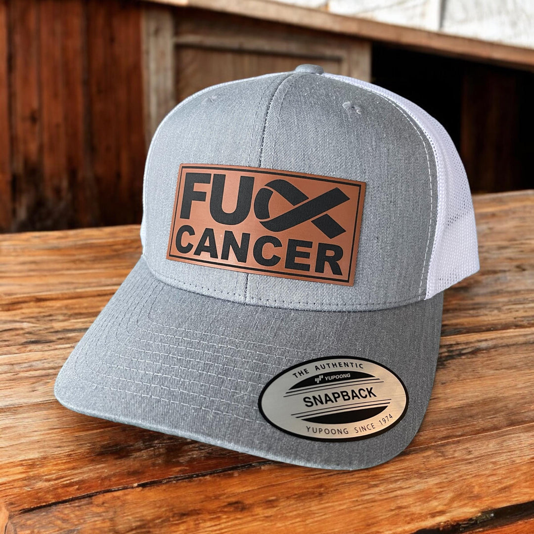 Fuck Cancer unisex cancer survivor trucker hat by BubbleHead Ink