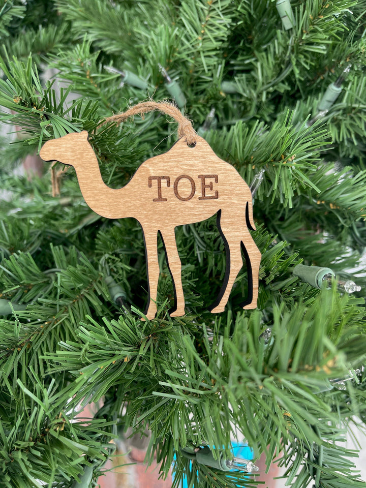 Funny camel adult white elephant Christmas ornament by BubbleHead Ink