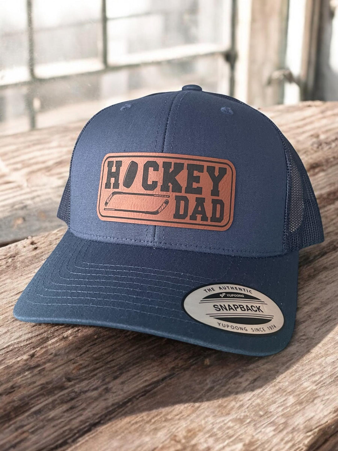 Hockey dad trucker hat by BubbleHead Ink