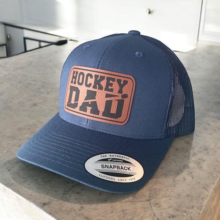 Hockey dad trucker hat by BubbleHead Ink