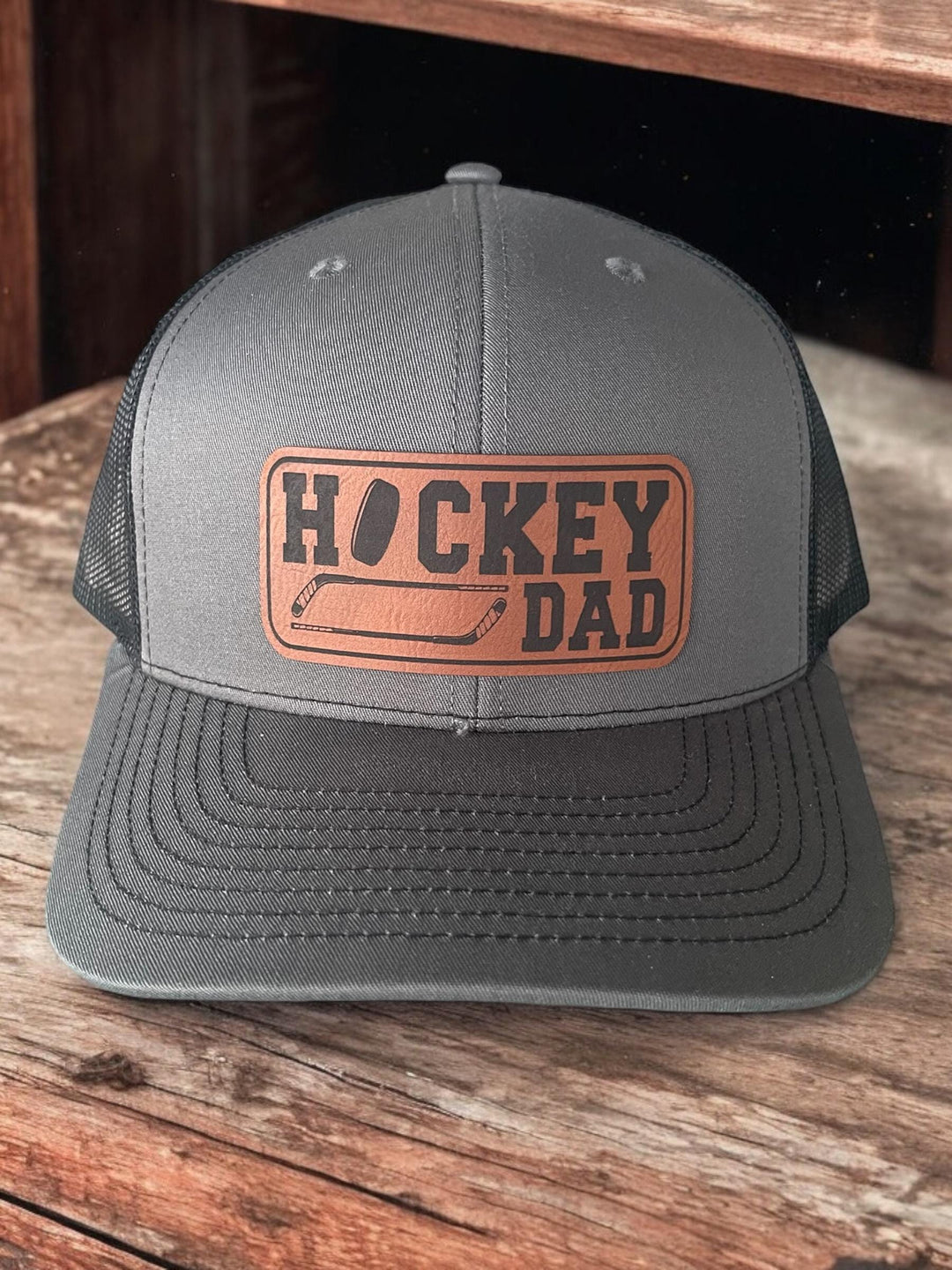Hockey dad trucker hat by BubbleHead Ink