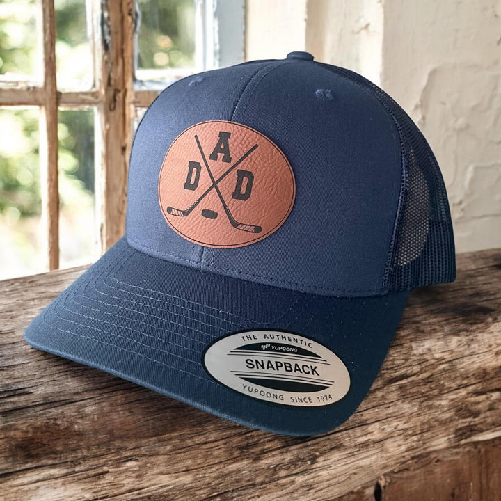 Hockey dad trucker hat by BubbleHead Ink
