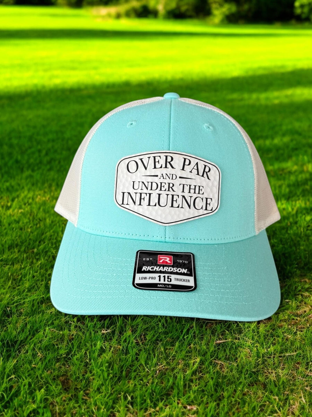 Over Par and Under the Influence girls golf trip trucker hat by BubbleHead Ink