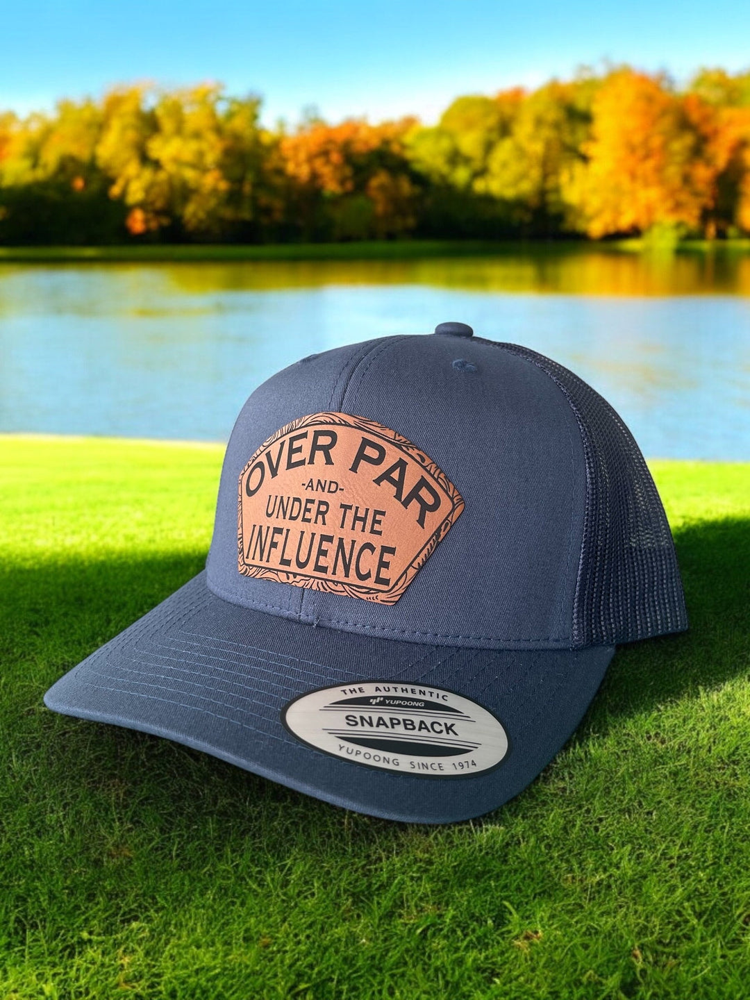 Over Par and Under the Influence funny golf trucker hat by BubbleHead Ink