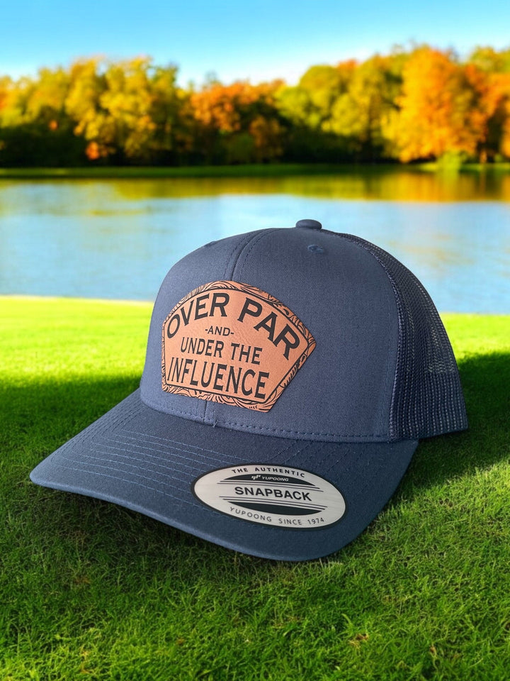Over Par and Under the Influence funny golf trucker hat by BubbleHead Ink