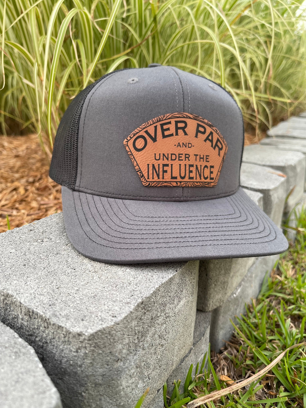 Over Par and Under the Influence funny golf trucker hat by BubbleHead Ink