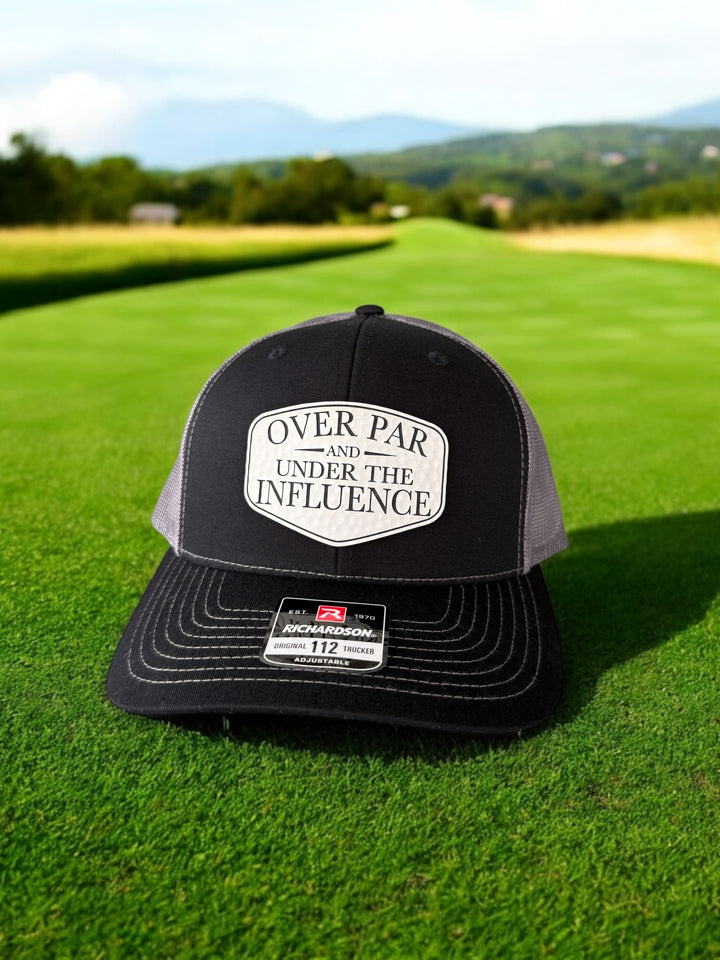 Over Par and Under the Influence funny golf Richardson 112 trucker hat by BubbleHead Ink