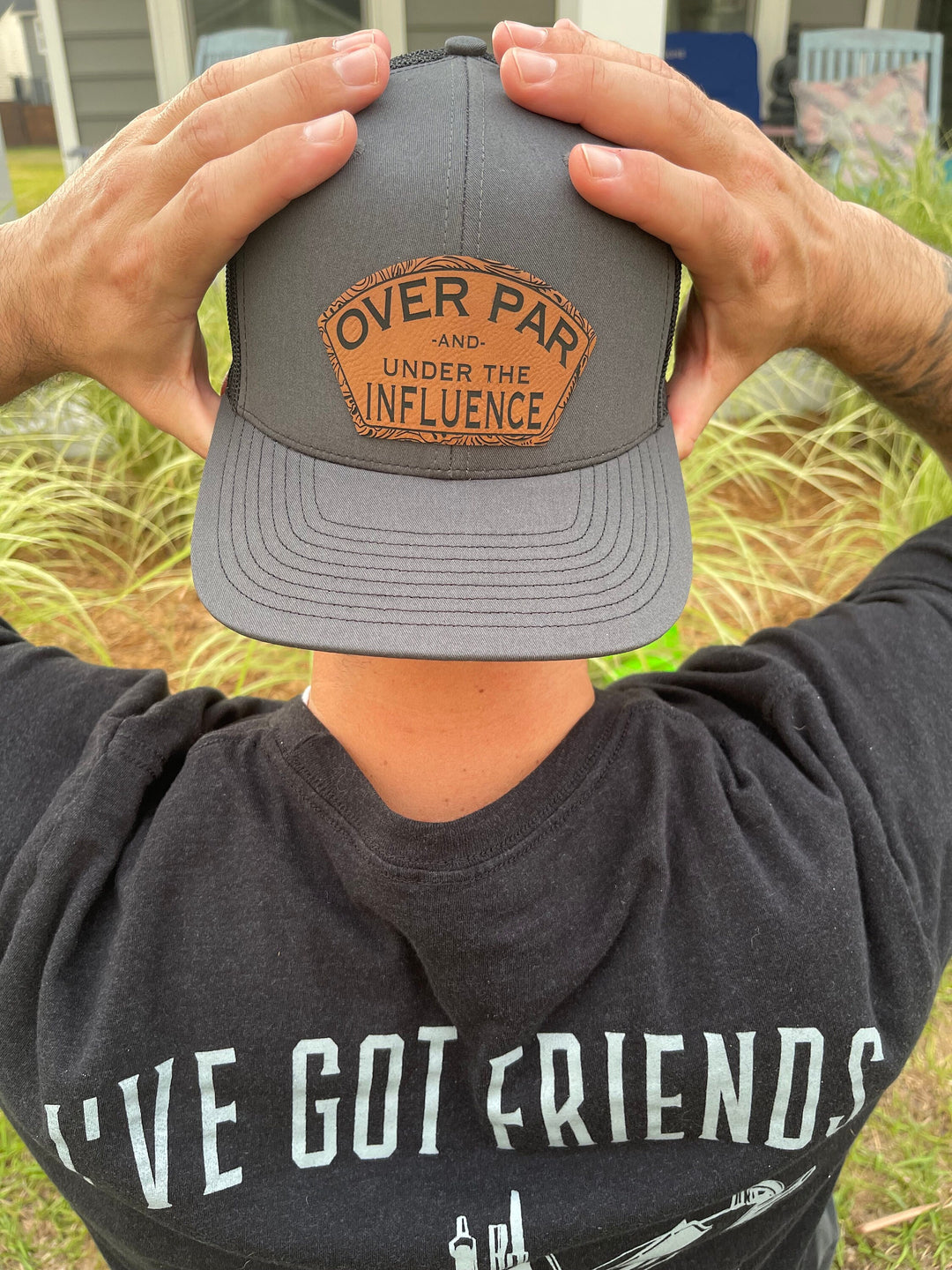 Over Par and Under the Influence funny golf trucker hat by BubbleHead Ink
