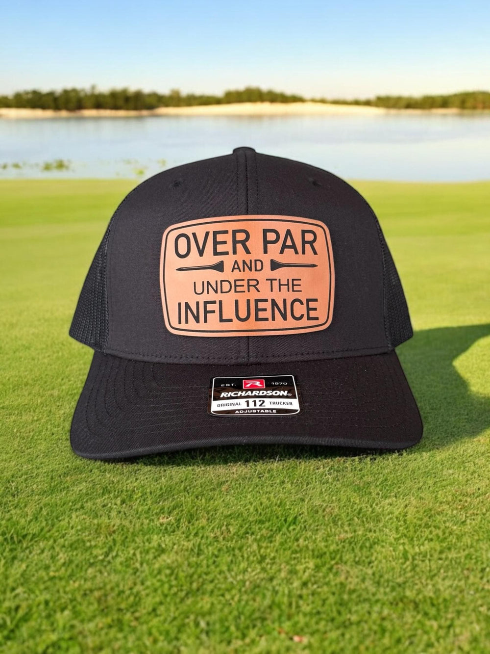 Over Par and Under the Influence funny golf trucker hat by BubbleHead Ink