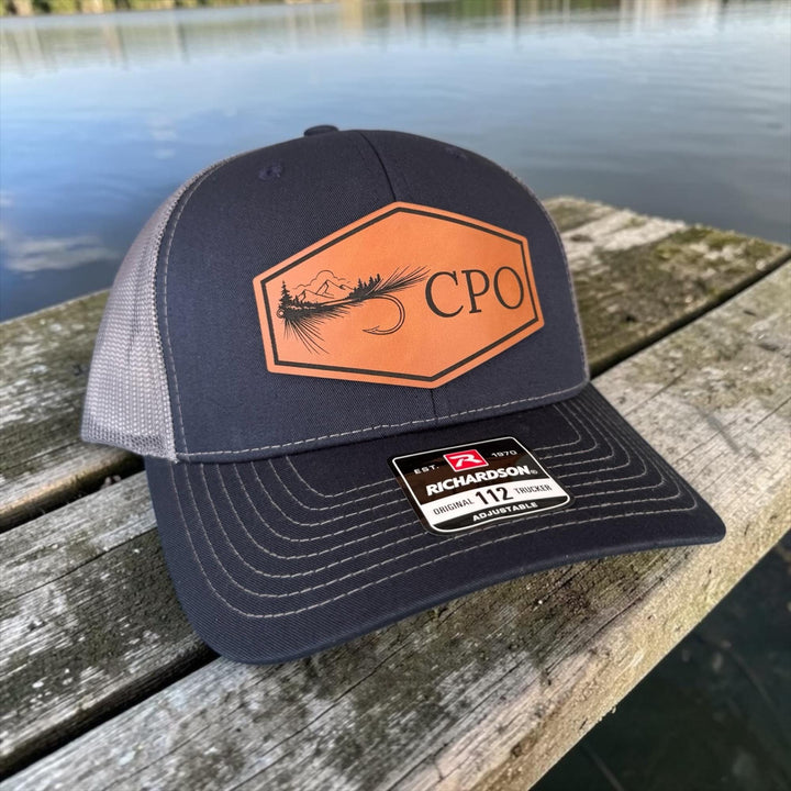 Personalized fly fishing trucker hat by BubbleHead Ink