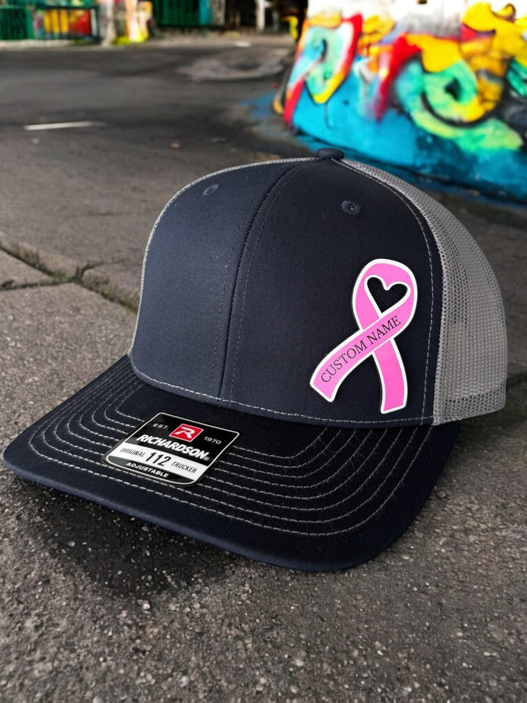 Personalized breast cancer pink ribbon support squad trucker hat by BubbleHead Ink
