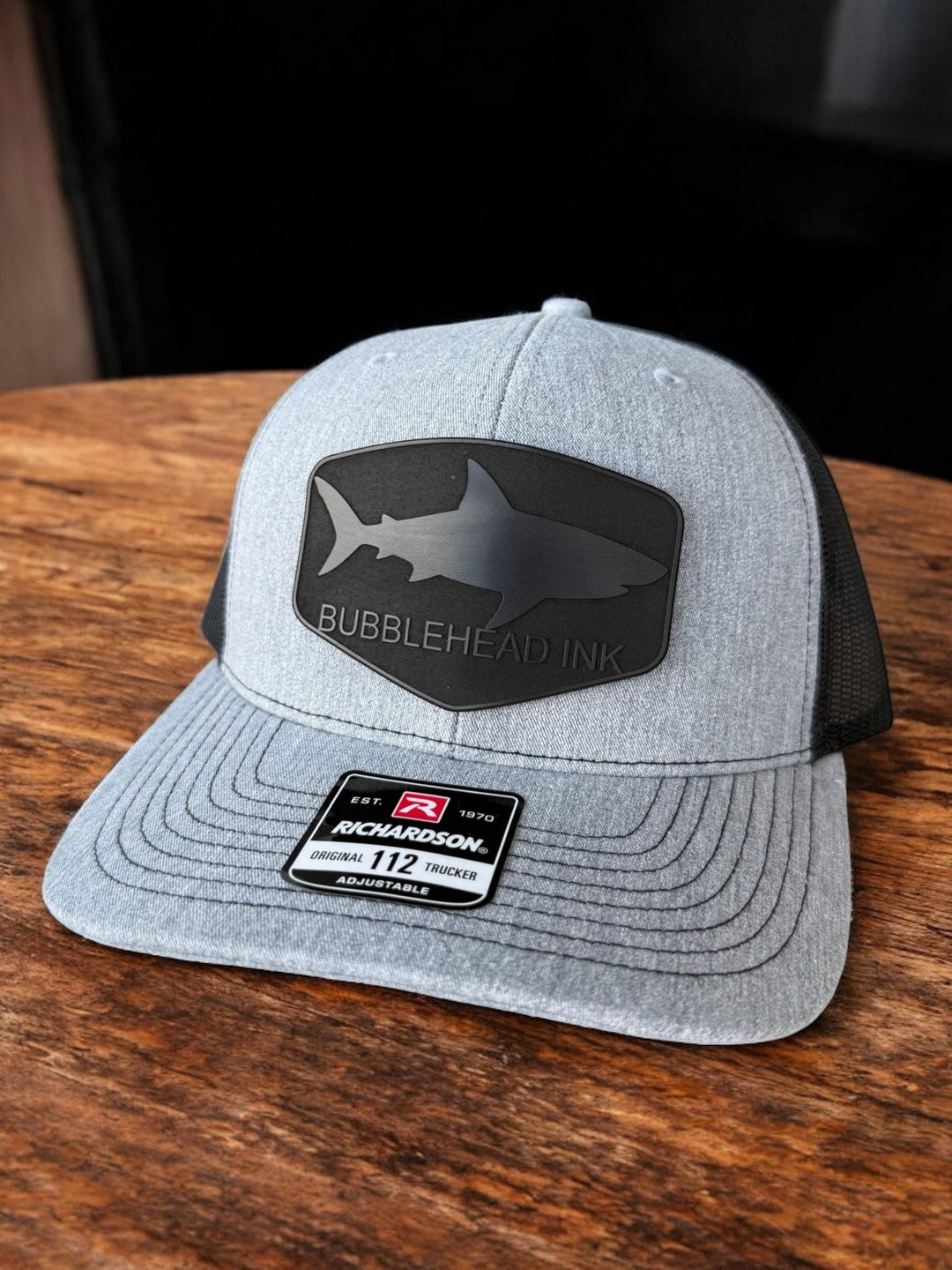 Shark silhouette BubbleHead Ink patch Richardson 112 trucker hat