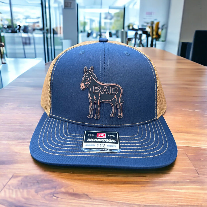 Smart Ass funny donkey leatherette patch trucker hat by BubbleHead Ink