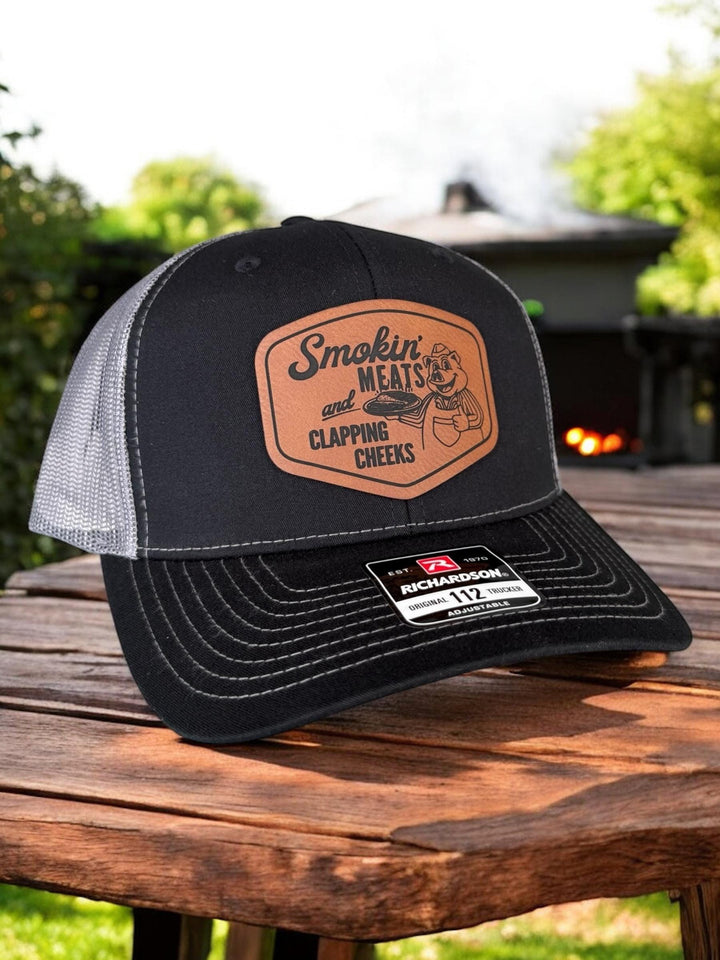 Smokin Meats and Clapping Cheeks funny BBQ trucker hat by BubbleHead Ink