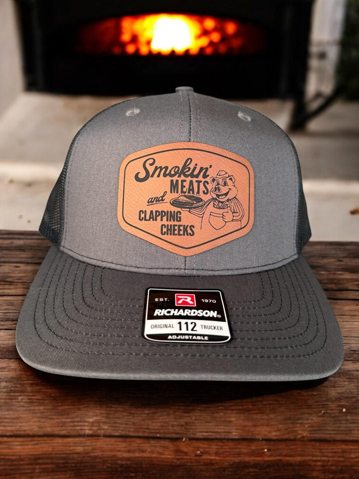 Smokin Meats and Clapping Cheeks funny BBQ trucker hat by BubbleHead Ink