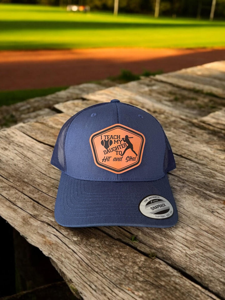 I Teach My Daughter How To Hit and Steal funny softball dad hat by BubbleHead Ink