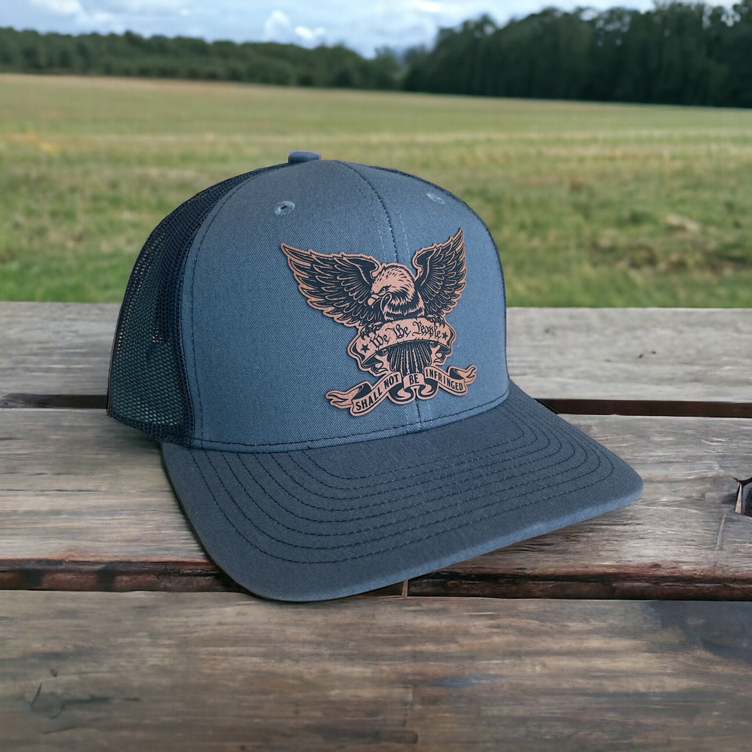 We The People eagle patriotic trucker hat by BubbleHead Ink