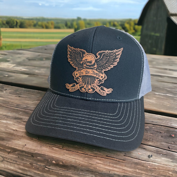 We The People eagle patriotic trucker hat by BubbleHead Ink