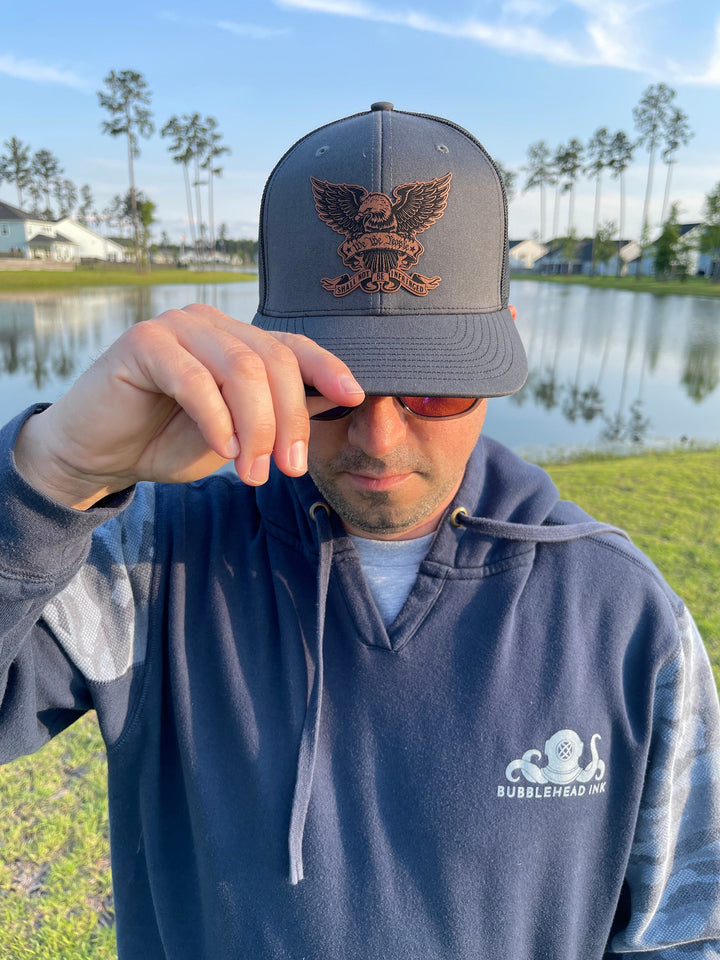 We The People eagle patriotic trucker hat by BubbleHead Ink
